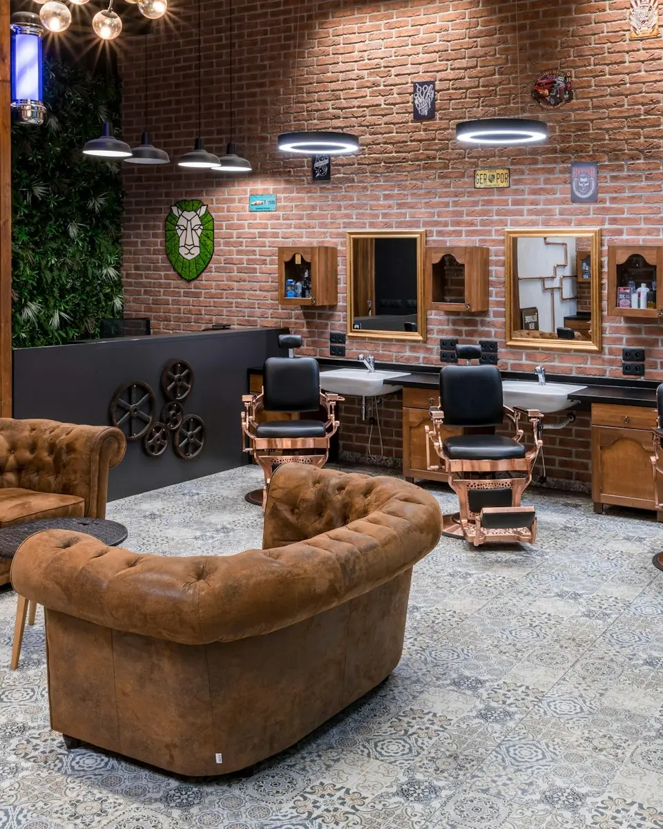 Barbershop interior with leather chairs and mirrors